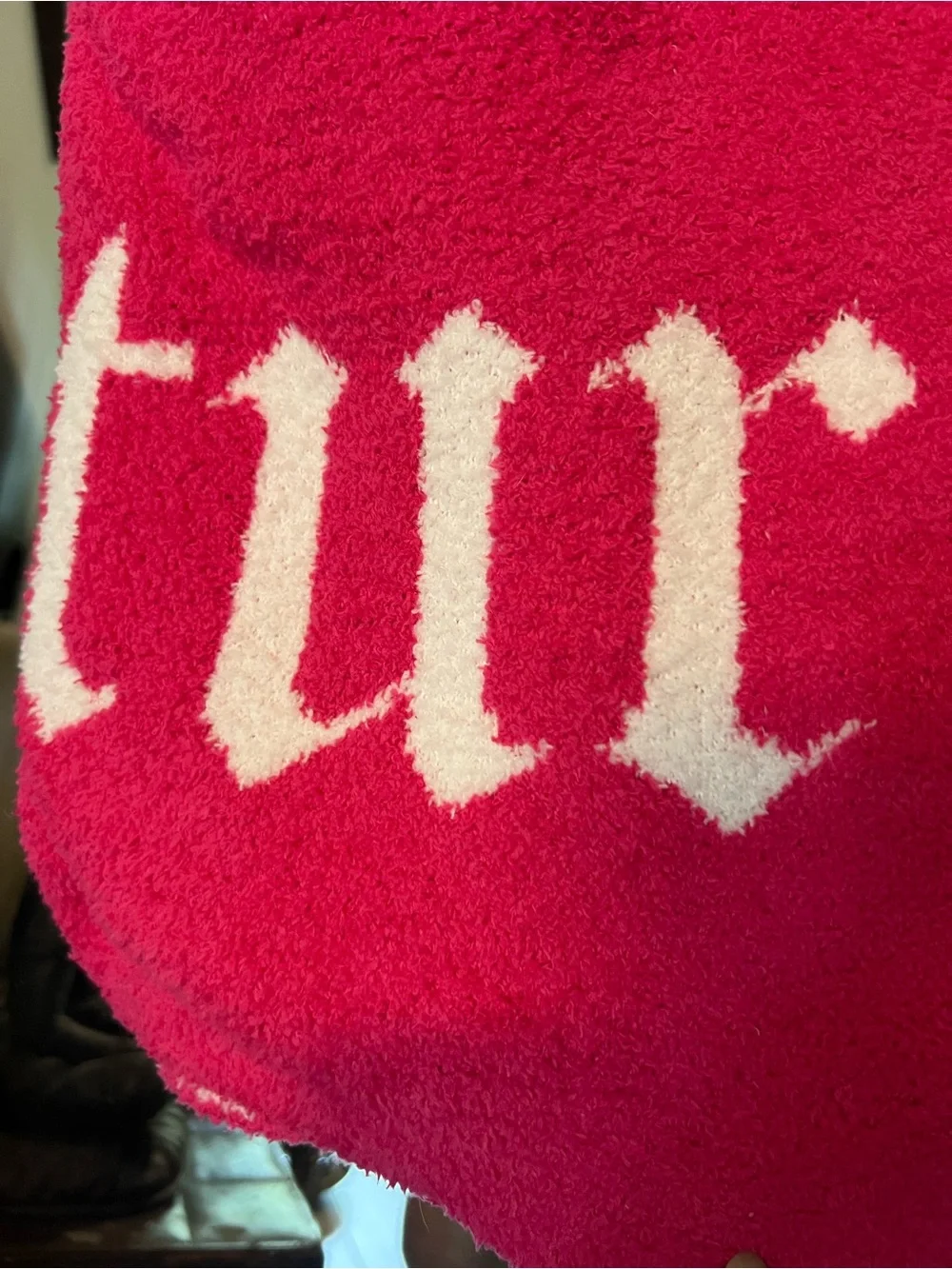 Juicy Couture Reversible Feather Knit Throw in Bright Pink with White Logo